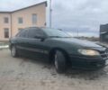 Зелений Опель Омега, об'ємом двигуна 2.5 л та пробігом 777 тис. км за 2000 $, фото 9 на Automoto.ua