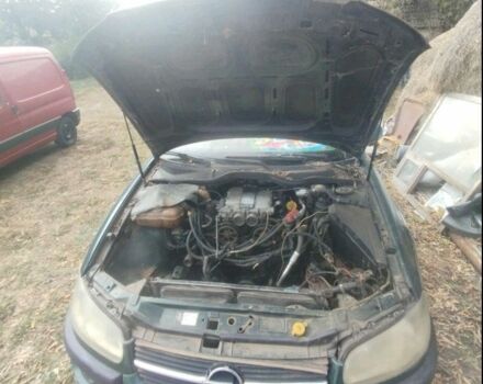 Зеленый Опель Омега, объемом двигателя 3 л и пробегом 300 тыс. км за 695 $, фото 5 на Automoto.ua