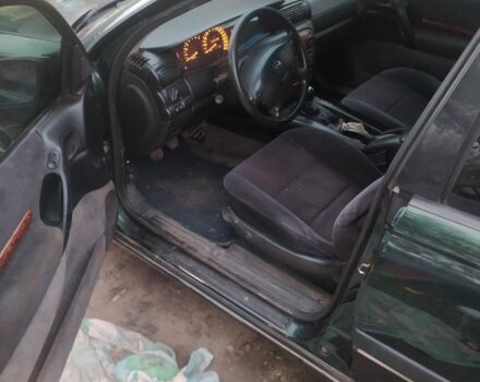 Зеленый Опель Омега, объемом двигателя 2.5 л и пробегом 100 тыс. км за 1100 $, фото 1 на Automoto.ua