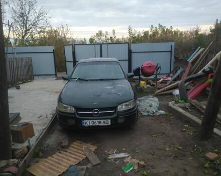 Зеленый Опель Омега, объемом двигателя 2.5 л и пробегом 100 тыс. км за 1100 $, фото 2 на Automoto.ua