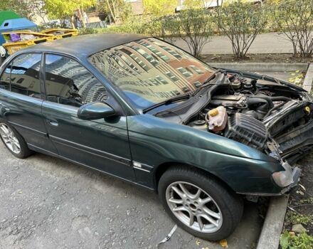 Зелений Опель Омега, об'ємом двигуна 2.5 л та пробігом 250 тис. км за 1157 $, фото 4 на Automoto.ua