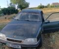 Зеленый Опель Омега, объемом двигателя 2 л и пробегом 200 тыс. км за 500 $, фото 1 на Automoto.ua