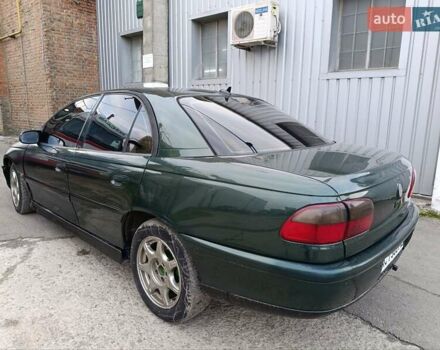 Зеленый Опель Омега, объемом двигателя 2 л и пробегом 321 тыс. км за 1100 $, фото 4 на Automoto.ua