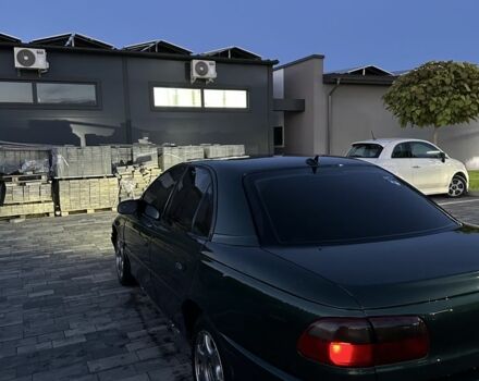 Зеленый Опель Омега, объемом двигателя 2 л и пробегом 250 тыс. км за 1400 $, фото 2 на Automoto.ua