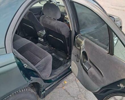 Зелений Опель Омега, об'ємом двигуна 2 л та пробігом 280 тис. км за 1899 $, фото 11 на Automoto.ua