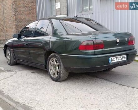 Зеленый Опель Омега, объемом двигателя 2 л и пробегом 321 тыс. км за 1100 $, фото 7 на Automoto.ua