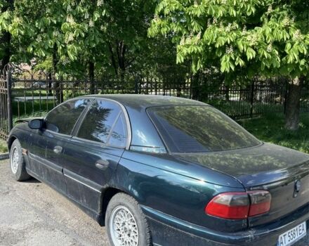 Зелений Опель Омега, об'ємом двигуна 2 л та пробігом 400 тис. км за 600 $, фото 6 на Automoto.ua