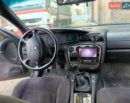 Зеленый Опель Омега, объемом двигателя 2 л и пробегом 321 тыс. км за 1100 $, фото 16 на Automoto.ua