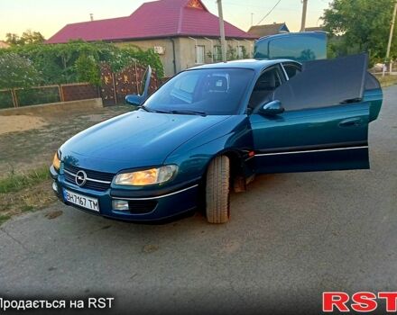 Зелений Опель Омега, об'ємом двигуна 2 л та пробігом 230 тис. км за 2300 $, фото 3 на Automoto.ua
