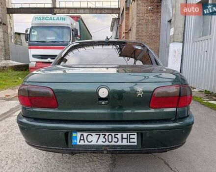 Зеленый Опель Омега, объемом двигателя 2 л и пробегом 321 тыс. км за 1100 $, фото 2 на Automoto.ua