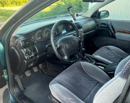 Зеленый Опель Омега, объемом двигателя 2 л и пробегом 190 тыс. км за 2200 $, фото 10 на Automoto.ua