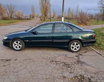 Зелений Опель Омега, об'ємом двигуна 2 л та пробігом 280 тис. км за 1899 $, фото 1 на Automoto.ua