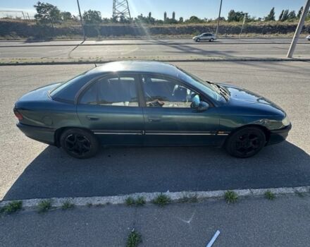 Зеленый Опель Омега, объемом двигателя 2 л и пробегом 200 тыс. км за 850 $, фото 1 на Automoto.ua