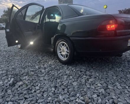 Зеленый Опель Омега, объемом двигателя 2 л и пробегом 372 тыс. км за 1400 $, фото 4 на Automoto.ua