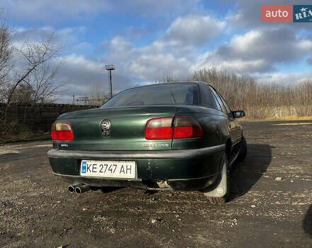 Зелений Опель Омега, об'ємом двигуна 2.96 л та пробігом 300 тис. км за 1350 $, фото 9 на Automoto.ua