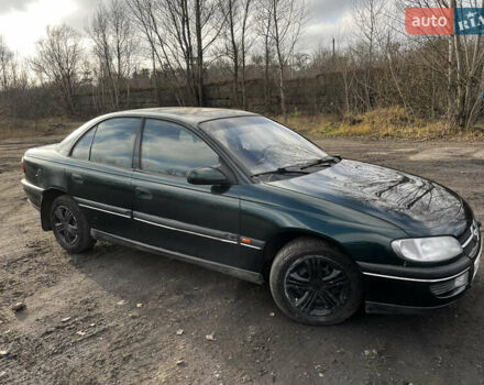 Зелений Опель Омега, об'ємом двигуна 2.96 л та пробігом 300 тис. км за 1350 $, фото 29 на Automoto.ua