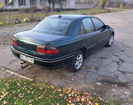 Зелений Опель Омега, об'ємом двигуна 2 л та пробігом 280 тис. км за 1899 $, фото 3 на Automoto.ua