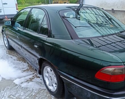 Зеленый Опель Омега, объемом двигателя 2 л и пробегом 999 тыс. км за 1300 $, фото 6 на Automoto.ua