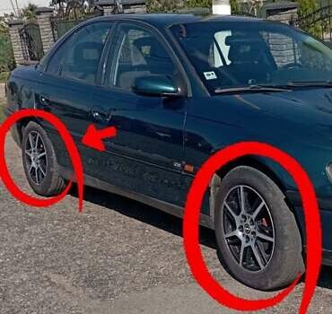 Зеленый Опель Омега, объемом двигателя 2 л и пробегом 190 тыс. км за 2200 $, фото 5 на Automoto.ua