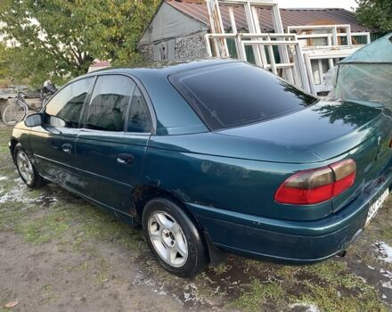 Зелений Опель Омега, об'ємом двигуна 2 л та пробігом 439 тис. км за 1069 $, фото 1 на Automoto.ua