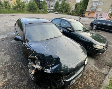 Зелений Опель Омега, об'ємом двигуна 2 л та пробігом 400 тис. км за 600 $, фото 1 на Automoto.ua