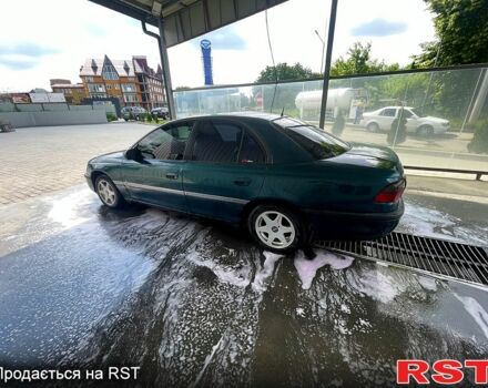 Зелений Опель Омега, об'ємом двигуна 2 л та пробігом 300 тис. км за 1600 $, фото 3 на Automoto.ua