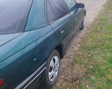 Зеленый Опель Омега, объемом двигателя 2.5 л и пробегом 450 тыс. км за 1800 $, фото 2 на Automoto.ua