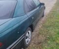 Зеленый Опель Омега, объемом двигателя 2.5 л и пробегом 450 тыс. км за 1800 $, фото 2 на Automoto.ua