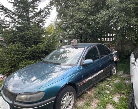 Зелений Опель Омега, об'ємом двигуна 2.5 л та пробігом 350 тис. км за 1500 $, фото 2 на Automoto.ua
