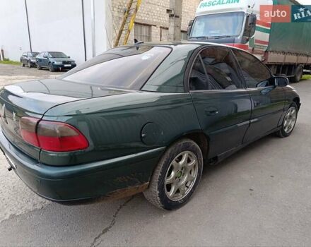 Зеленый Опель Омега, объемом двигателя 2 л и пробегом 321 тыс. км за 1100 $, фото 1 на Automoto.ua