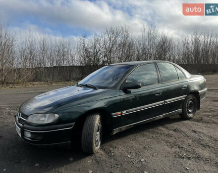 Зелений Опель Омега, об'ємом двигуна 2.96 л та пробігом 300 тис. км за 1350 $, фото 4 на Automoto.ua