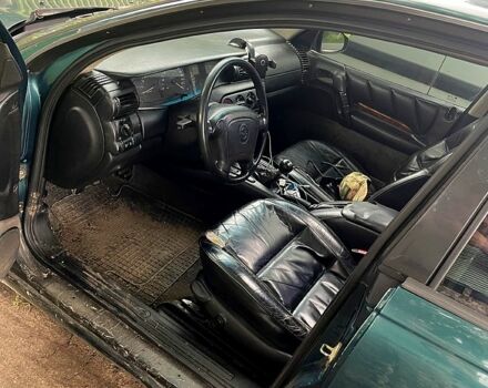Зелений Опель Омега, об'ємом двигуна 2 л та пробігом 300 тис. км за 1600 $, фото 6 на Automoto.ua
