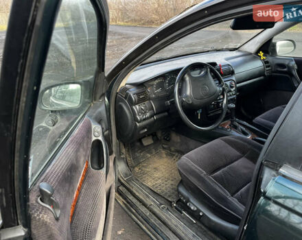 Зелений Опель Омега, об'ємом двигуна 2.96 л та пробігом 300 тис. км за 1350 $, фото 21 на Automoto.ua