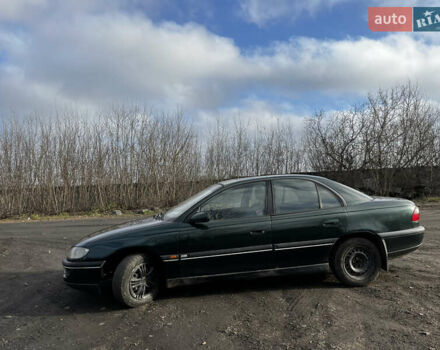 Зелений Опель Омега, об'ємом двигуна 2.96 л та пробігом 300 тис. км за 1350 $, фото 5 на Automoto.ua