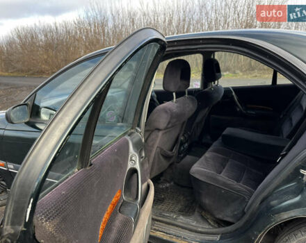 Зелений Опель Омега, об'ємом двигуна 2.96 л та пробігом 300 тис. км за 1350 $, фото 20 на Automoto.ua