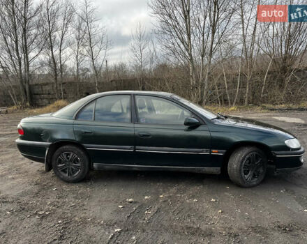 Зелений Опель Омега, об'ємом двигуна 2.96 л та пробігом 300 тис. км за 1350 $, фото 12 на Automoto.ua