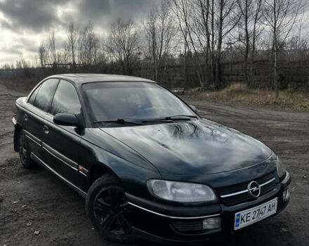 Зелений Опель Омега, об'ємом двигуна 2.96 л та пробігом 300 тис. км за 1350 $, фото 15 на Automoto.ua