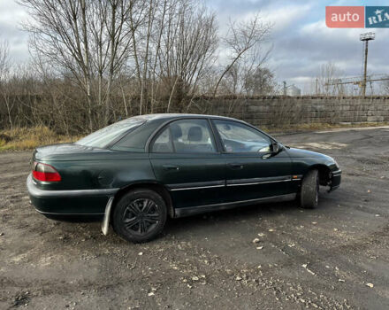 Зелений Опель Омега, об'ємом двигуна 2.96 л та пробігом 300 тис. км за 1350 $, фото 11 на Automoto.ua