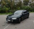 Зелений Опель Омега, об'ємом двигуна 2 л та пробігом 367 тис. км за 1550 $, фото 9 на Automoto.ua