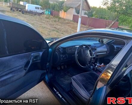 Зелений Опель Омега, об'ємом двигуна 2 л та пробігом 230 тис. км за 2300 $, фото 4 на Automoto.ua