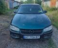 Зелений Опель Омега, об'ємом двигуна 2 л та пробігом 350 тис. км за 1100 $, фото 1 на Automoto.ua