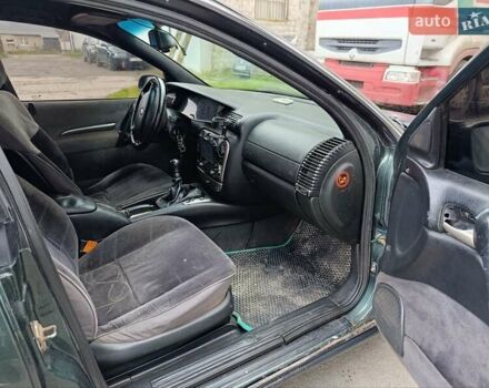 Зеленый Опель Омега, объемом двигателя 2 л и пробегом 321 тыс. км за 1100 $, фото 14 на Automoto.ua