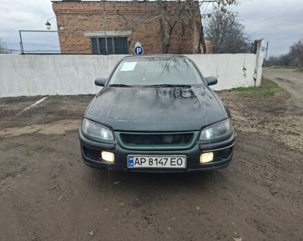 Зеленый Опель Омега, объемом двигателя 2 л и пробегом 189 тыс. км за 700 $, фото 1 на Automoto.ua