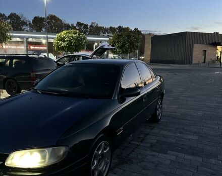 Зеленый Опель Омега, объемом двигателя 2 л и пробегом 250 тыс. км за 1400 $, фото 1 на Automoto.ua