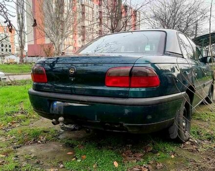 Зеленый Опель Омега, объемом двигателя 2 л и пробегом 300 тыс. км за 2700 $, фото 1 на Automoto.ua