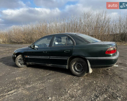 Зелений Опель Омега, об'ємом двигуна 2.96 л та пробігом 300 тис. км за 1350 $, фото 6 на Automoto.ua
