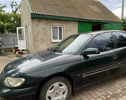 Зеленый Опель Омега, объемом двигателя 2 л и пробегом 482 тыс. км за 2500 $, фото 5 на Automoto.ua