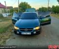 Зеленый Опель Омега, объемом двигателя 2 л и пробегом 230 тыс. км за 2300 $, фото 1 на Automoto.ua