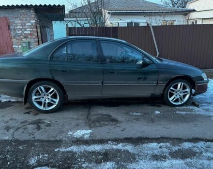 Зелений Опель Омега, об'ємом двигуна 3 л та пробігом 3 тис. км за 1000 $, фото 5 на Automoto.ua