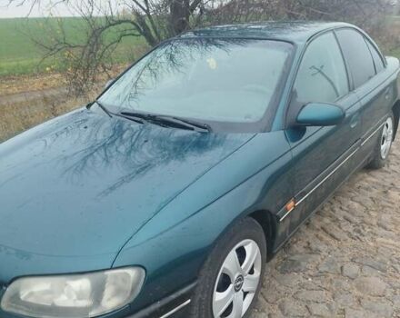 Зеленый Опель Омега, объемом двигателя 2.5 л и пробегом 450 тыс. км за 1800 $, фото 4 на Automoto.ua